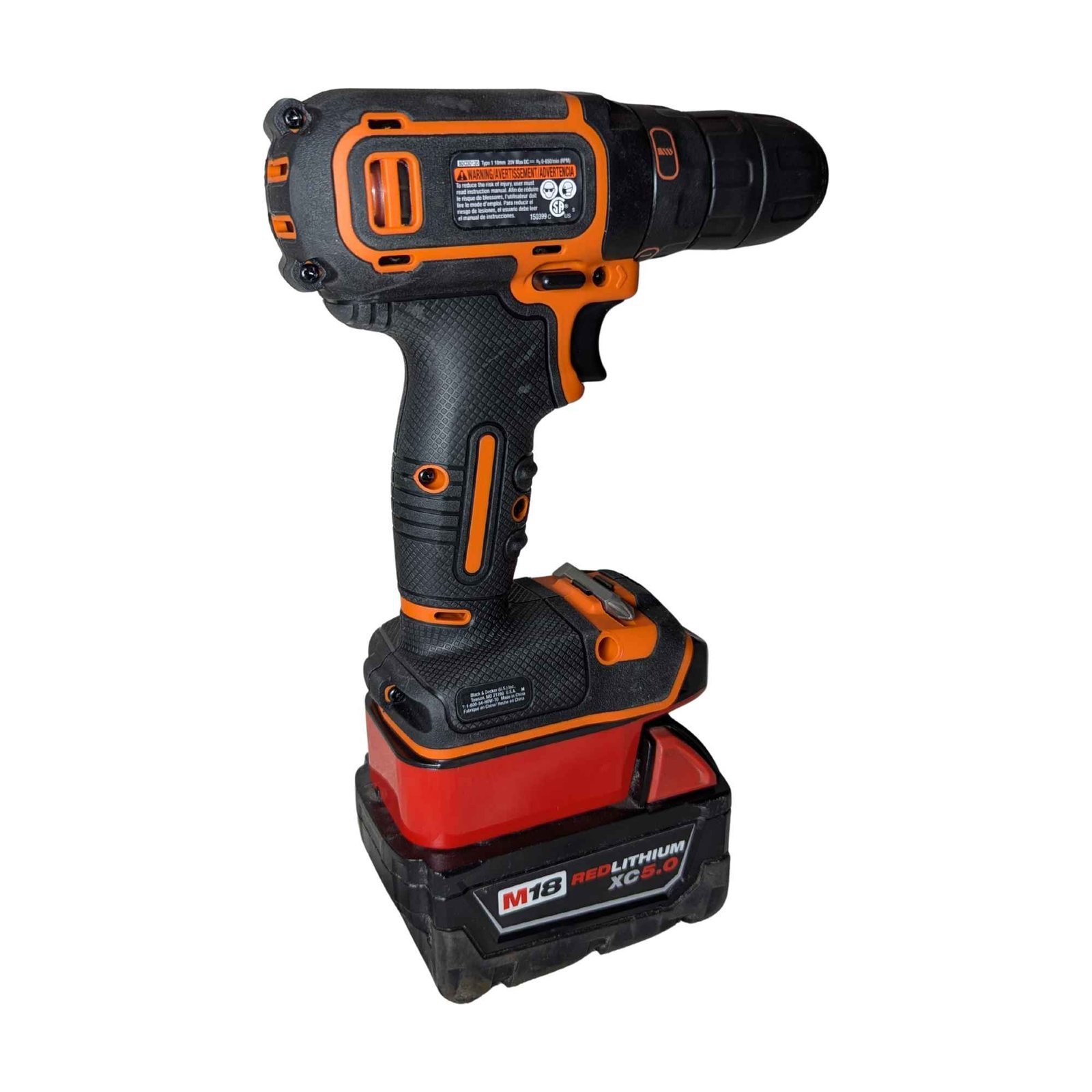 A cordless drill and charger neatly arranged on a workbench for troubleshooting help.