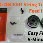 A professional view of a Black and Decker electric trimmer sitting on grass.