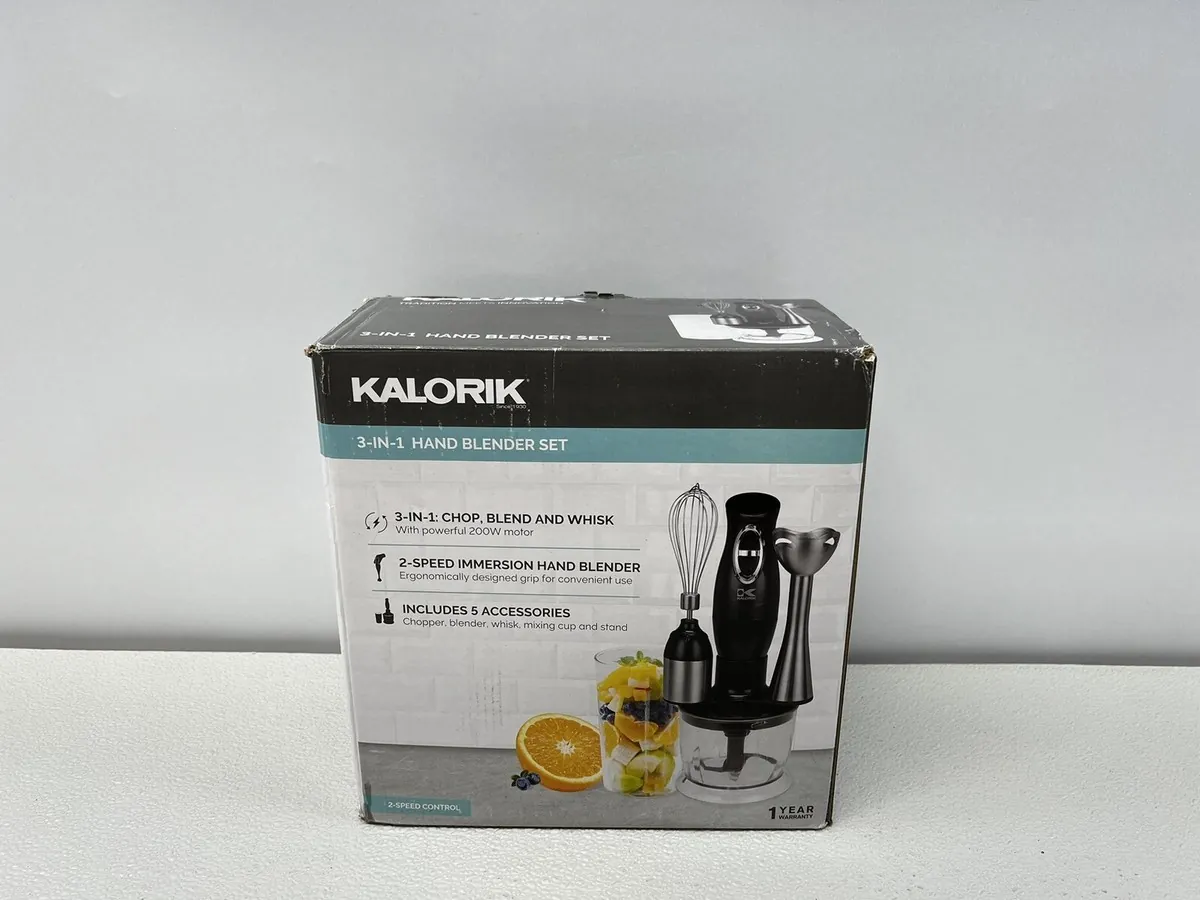 Checking the safety interlock mechanism on a kitchen blender base.