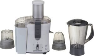 A disassembled electric juicer on a clean kitchen counter awaiting troubleshooting and repair.