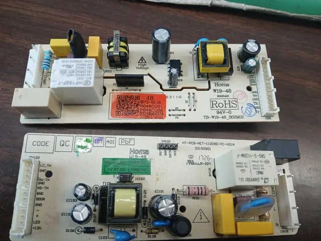 Essential tools and a replacement fan motor for a professional refrigerator repair.