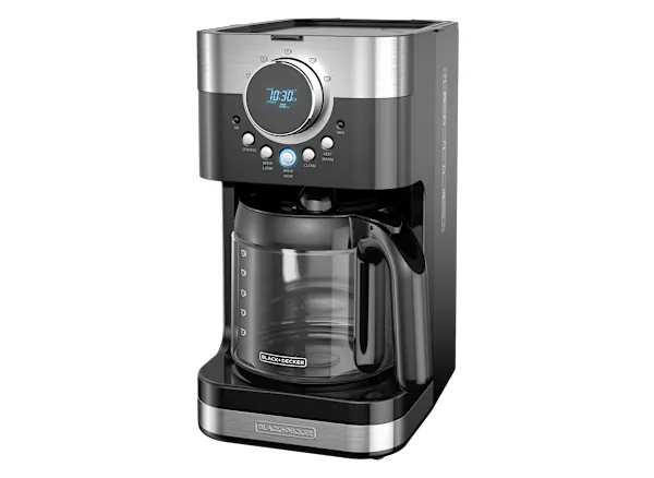 Hands carefully inspect the power cord of a black coffee maker.