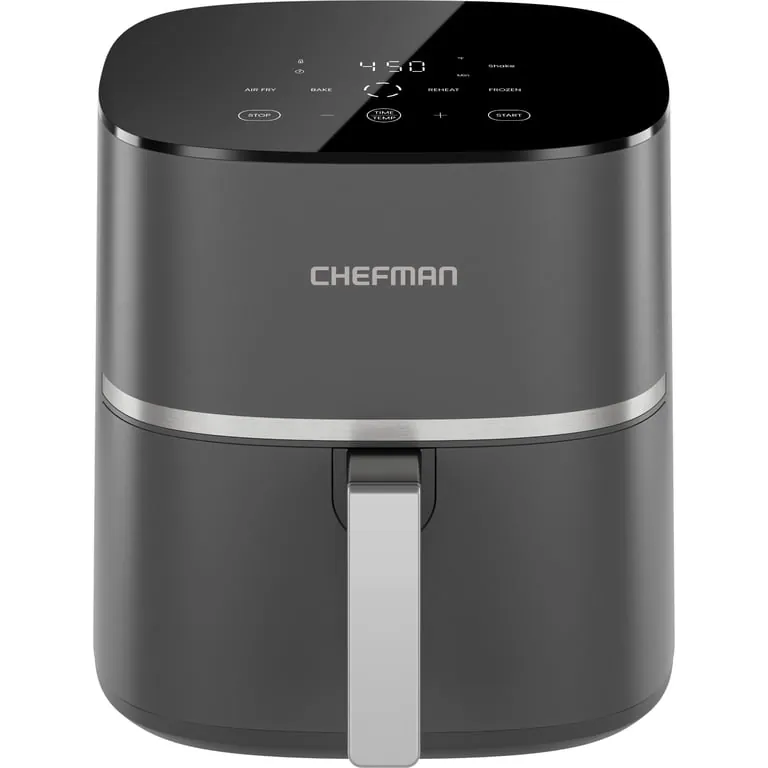Hands clean the digital interface of an air fryer with a microfiber cloth.