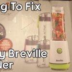 A modern Breville blender sitting on a clean kitchen counter in natural light.