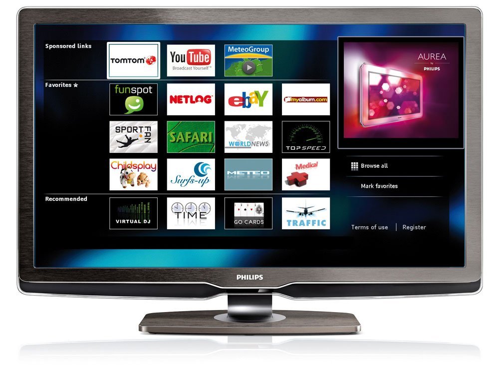 A wireless router sitting on a wooden console near a Philips television set.