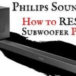 A modern Philips sound bar and subwoofer setup in a clean living room.