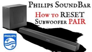 A modern Philips sound bar and subwoofer setup in a clean living room.