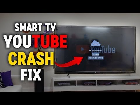 A person relaxing in a living room while watching a smart TV.