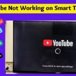 A smart TV displaying a YouTube error message on a living room wall.