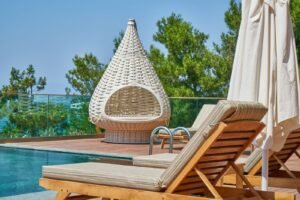 Natural rattan chair with woven seat in a bright modern living room